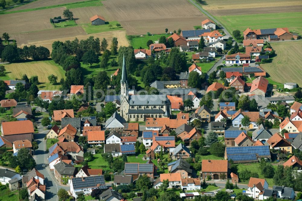 Aerial image Körbecke - Village - view on the edge of agricultural fields and farmland in Koerbecke in the state North Rhine-Westphalia, Germany