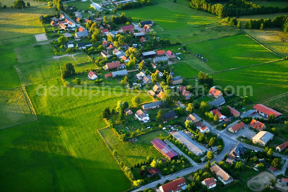 Leussow from the bird's eye view: Village - view on the edge of agricultural fields and farmland in Leussow in the state Mecklenburg - Western Pomerania, Germany