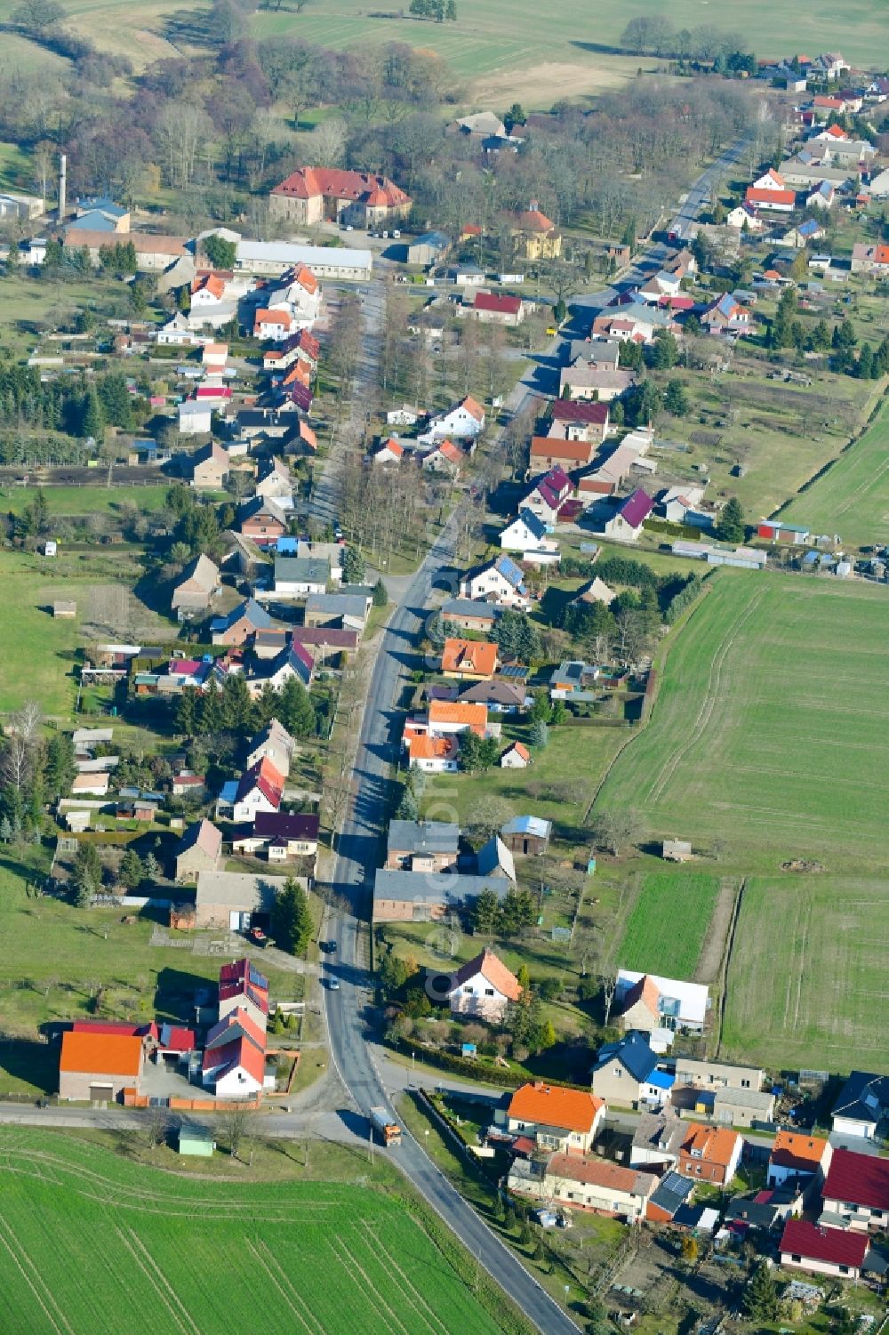 Aerial image Lindenberg - Village - view on the edge of agricultural fields and farmland in Lindenberg in the state Brandenburg, Germany