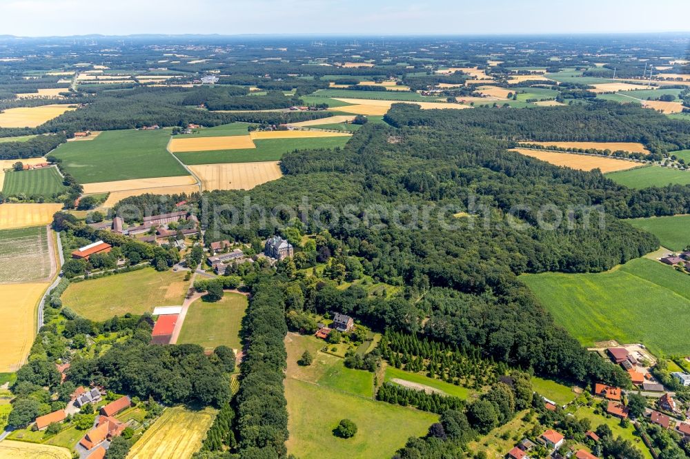 Loburg from the bird's eye view: Village - view on the edge of agricultural fields and farmland in Loburg in the state North Rhine-Westphalia, Germany