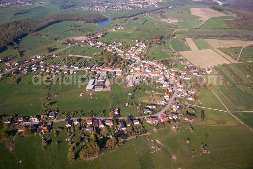 Aerial photograph Macheren - Village - view on the edge of agricultural fields and farmland in Macheren in Grand Est, France