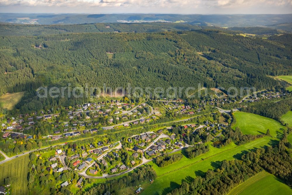 Meschede from the bird's eye view: Village - view on the edge of agricultural fields and farmland in Meschede in the state North Rhine-Westphalia, Germany