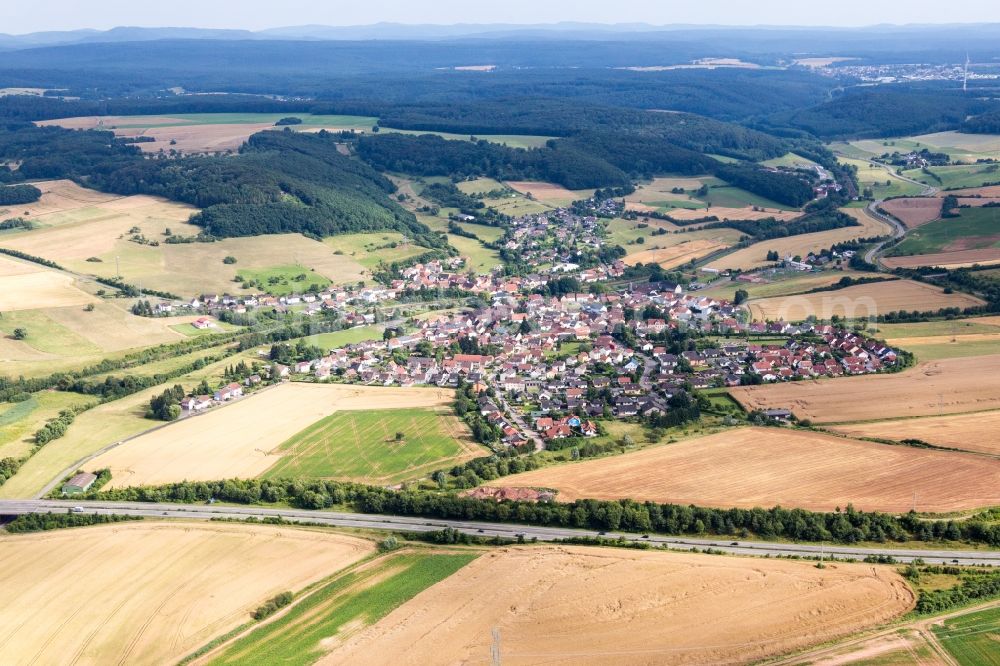 Münchweiler an der Alsenz from above - Village - view on the edge of agricultural fields and farmland in Muenchweiler an der Alsenz in the state Rhineland-Palatinate, Germany