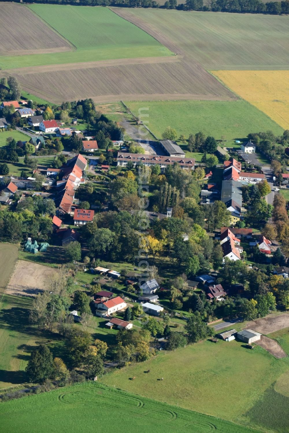 Aerial image Molkenberg - Village - view on the edge of agricultural fields and farmland in Molkenberg in the state Brandenburg, Germany