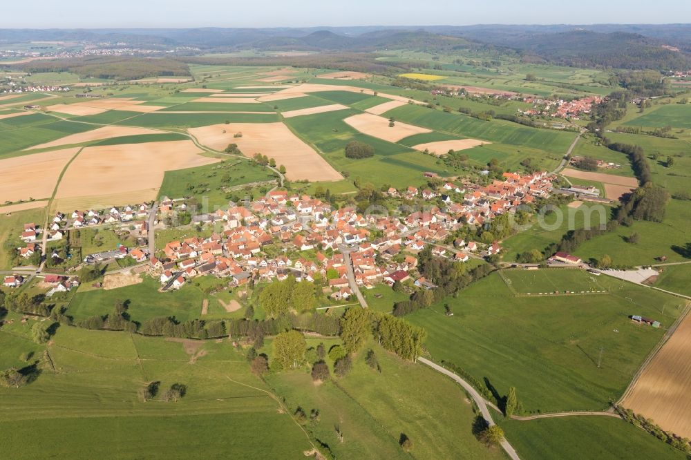 Mulhausen from the bird's eye view: Village - view on the edge of agricultural fields and farmland in Mulhausen in Grand Est, France