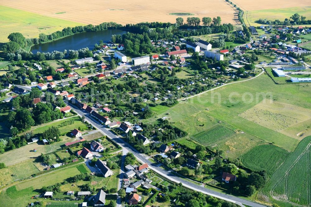 Neetzka from the bird's eye view: Village - view on the edge of agricultural fields and farmland in Neetzka in the state Mecklenburg - Western Pomerania, Germany