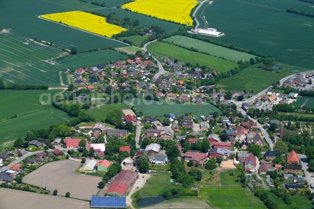 Neuengörs from above - Village - view on the edge of agricultural fields and farmland in Neuengoers in the state Schleswig-Holstein, Germany