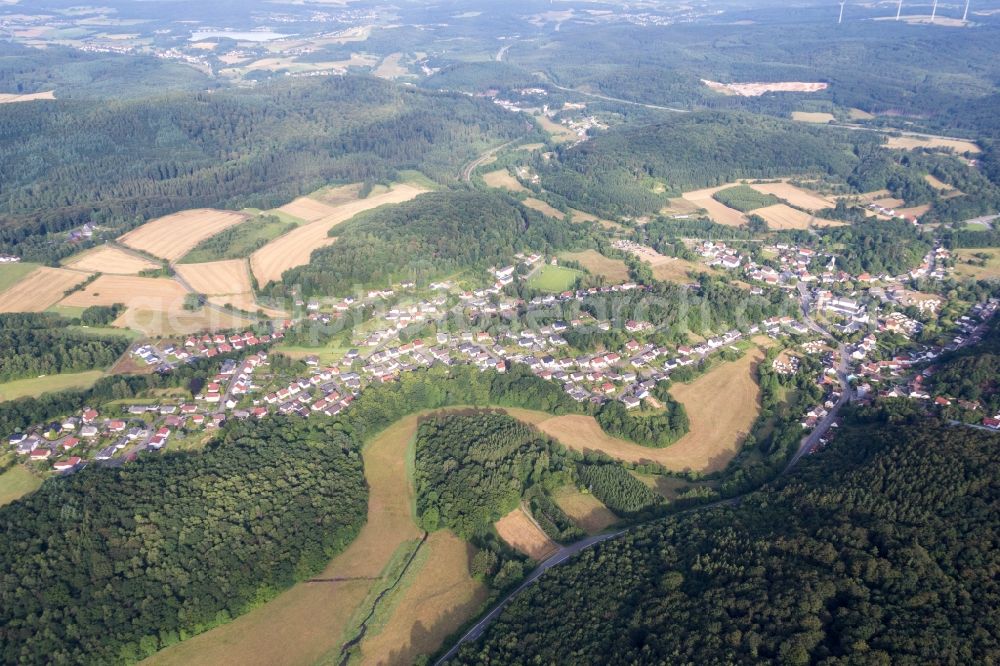 Nohfelden from the bird's eye view: Village - view on the edge of agricultural fields and farmland in Nohfelden in the state Saarland, Germany