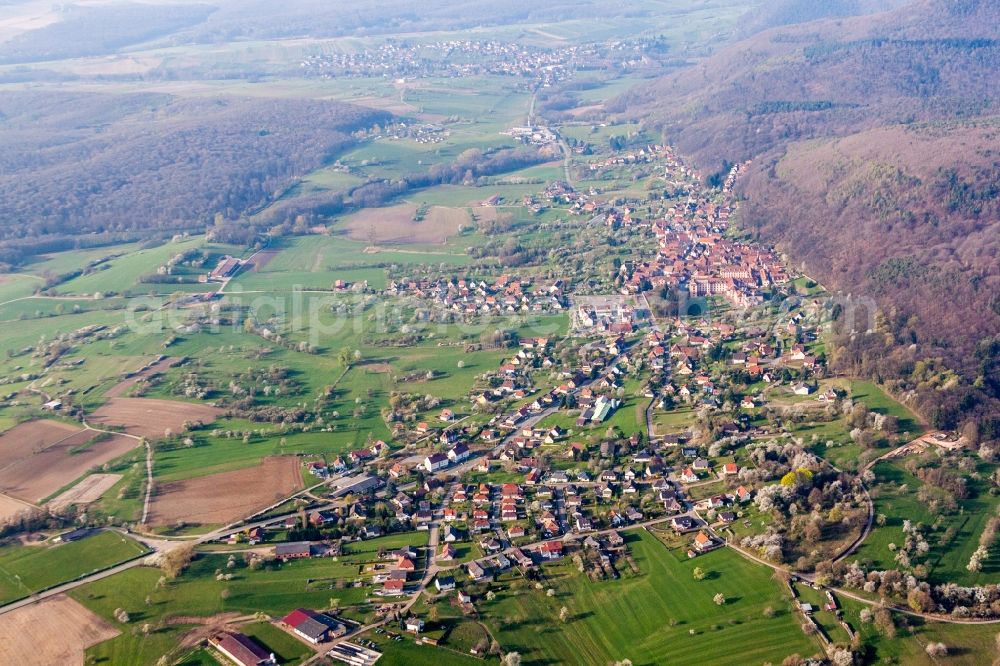 Aerial image Oberbronn - Village - view on the edge of agricultural fields and farmland in Oberbronn in Grand Est, France