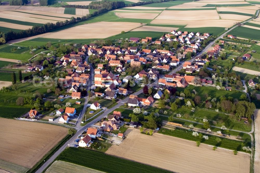 Hoffen from the bird's eye view: Village - view on the edge of agricultural fields and farmland in Hoffen in Grand Est, France