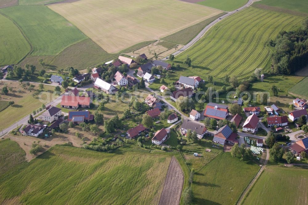 Herdwangen-Schönach from the bird's eye view: Village - view on the edge of agricultural fields and farmland in the district Ebratsweiler in Herdwangen-Schoenach in the state Baden-Wuerttemberg, Germany