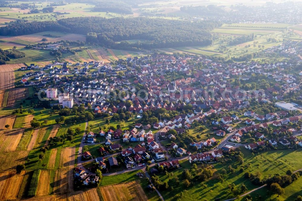 Neulingen from the bird's eye view: Village - view on the edge of agricultural fields and farmland in the district Goebrichen in Neulingen in the state Baden-Wuerttemberg, Germany