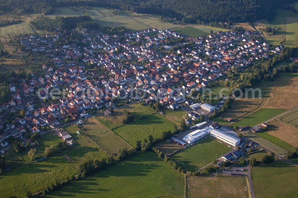 Gründau from above - Village - view on the edge of agricultural fields and farmland in the district Hain-Gruendau in Gruendau in the state Hesse, Germany