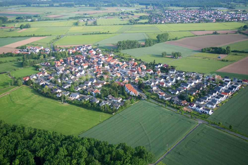 Babenhausen from above - Village - view on the edge of agricultural fields and farmland in the district Harpertshausen in Babenhausen in the state Hesse, Germany