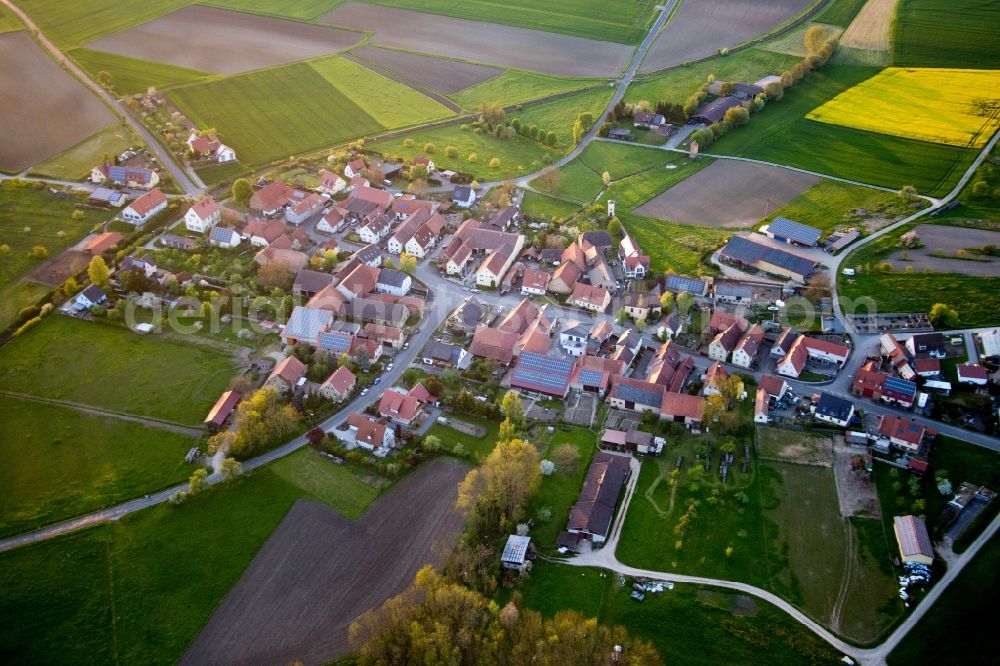 Prichsenstadt from the bird's eye view: Village - view on the edge of agricultural fields and farmland in the district Jaerkendorf in Prichsenstadt in the state Bavaria, Germany