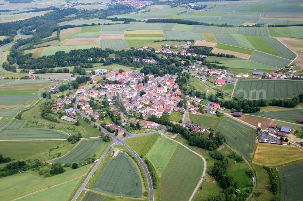 Großeibstadt from the bird's eye view: Village - view on the edge of agricultural fields and farmland in the district Kleineibstadt in Grosseibstadt in the state Bavaria, Germany