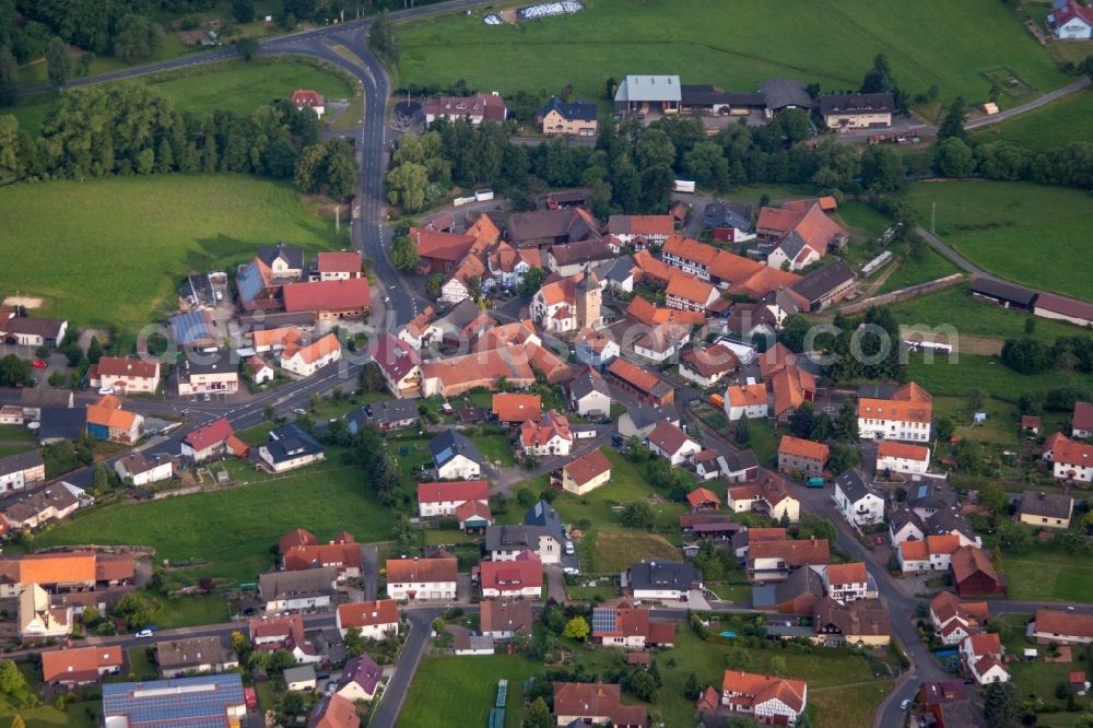 Großenlüder from above - Village - view on the edge of agricultural fields and farmland in the district Kleinlueder in Grossenlueder in the state Hesse, Germany