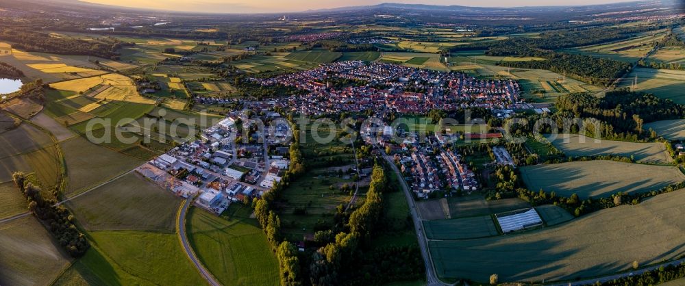 Dettenheim from the bird's eye view: Village - view on the edge of agricultural fields and farmland in the district Liedolsheim in Dettenheim in the state Baden-Wurttemberg, Germany