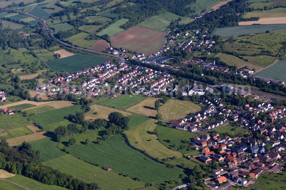 Höxter from above - Village - view on the edge of agricultural fields and farmland in the district Ottbergen in Hoexter in the state North Rhine-Westphalia, Germany