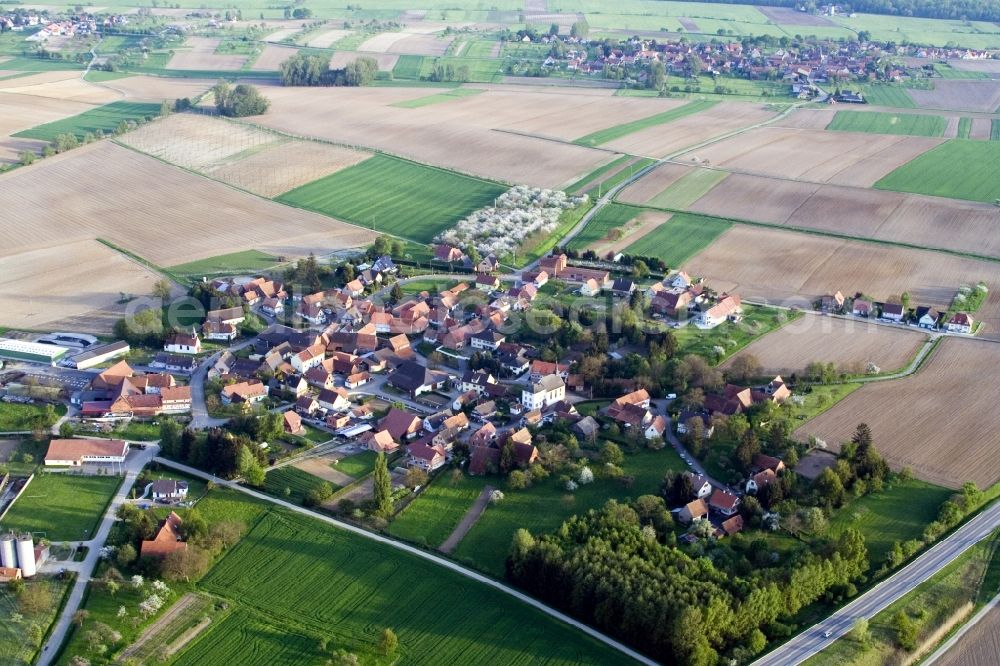 Aerial image Betschdorf - Village - view on the edge of agricultural fields and farmland in the district Reimerswiller in Betschdorf in Grand Est, France