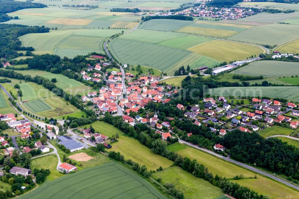 Aerial image Thundorf in Unterfranken - Village - view on the edge of agricultural fields and farmland in the district Rothhausen in Thundorf in Unterfranken in the state Bavaria, Germany