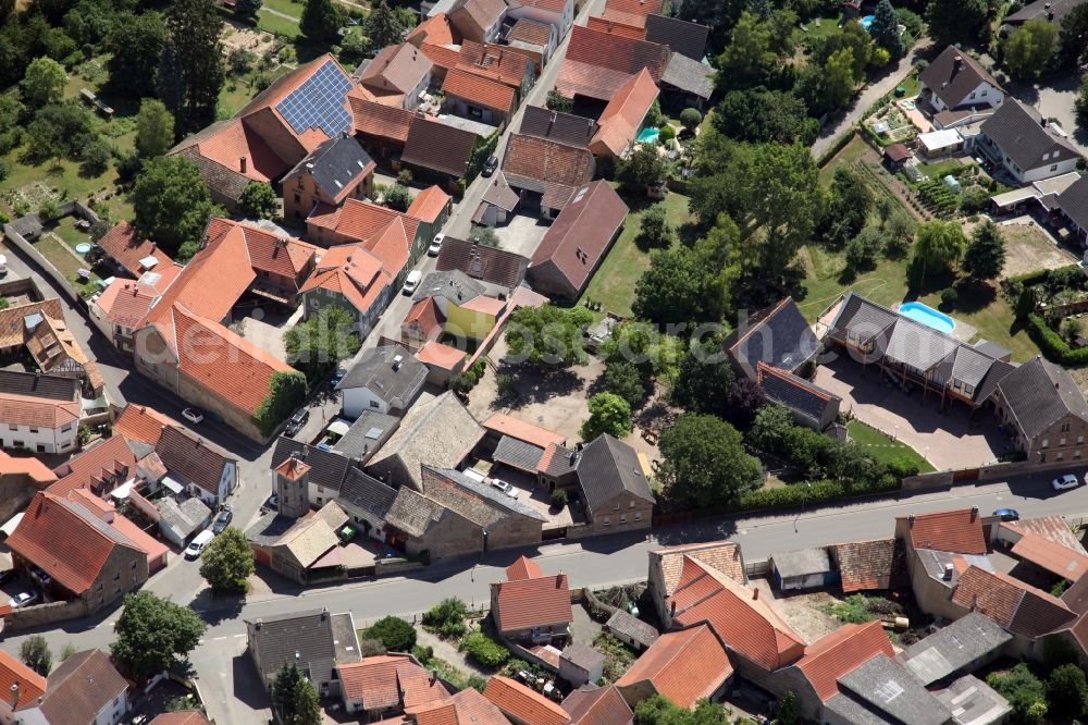 Armsheim from the bird's eye view: Village - view on the edge of agricultural fields and farmland in the district Schimsheim in Armsheim in the state Rhineland-Palatinate, Germany