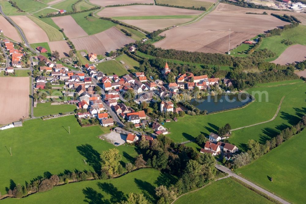 Aerial image Scheinfeld - Village - view on the edge of agricultural fields and farmland in the district Schnodsenbach in Scheinfeld in the state Bavaria, Germany