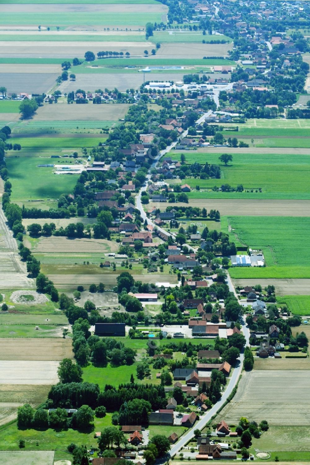 Aerial photograph Rodewald - Village - view on the edge of agricultural fields and farmland in the district Untere Bauerschaft in Rodewald in the state Lower Saxony, Germany