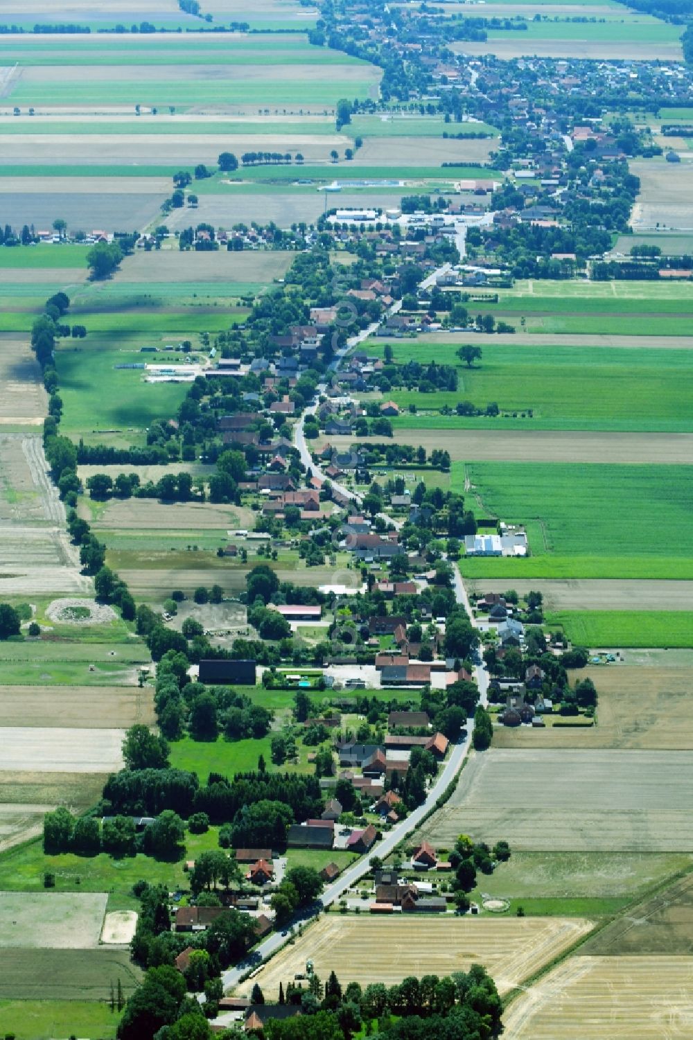 Rodewald from above - Village - view on the edge of agricultural fields and farmland in the district Untere Bauerschaft in Rodewald in the state Lower Saxony, Germany