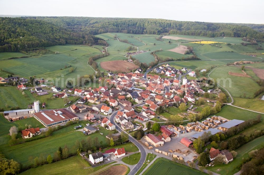 Rauhenebrach from above - Village - view on the edge of agricultural fields and farmland in the district Wustviel in Rauhenebrach in the state Bavaria, Germany