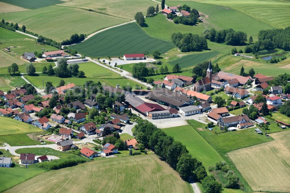 Pauluszell from the bird's eye view: Village - view on the edge of agricultural fields and farmland in Pauluszell in the state Bavaria, Germany