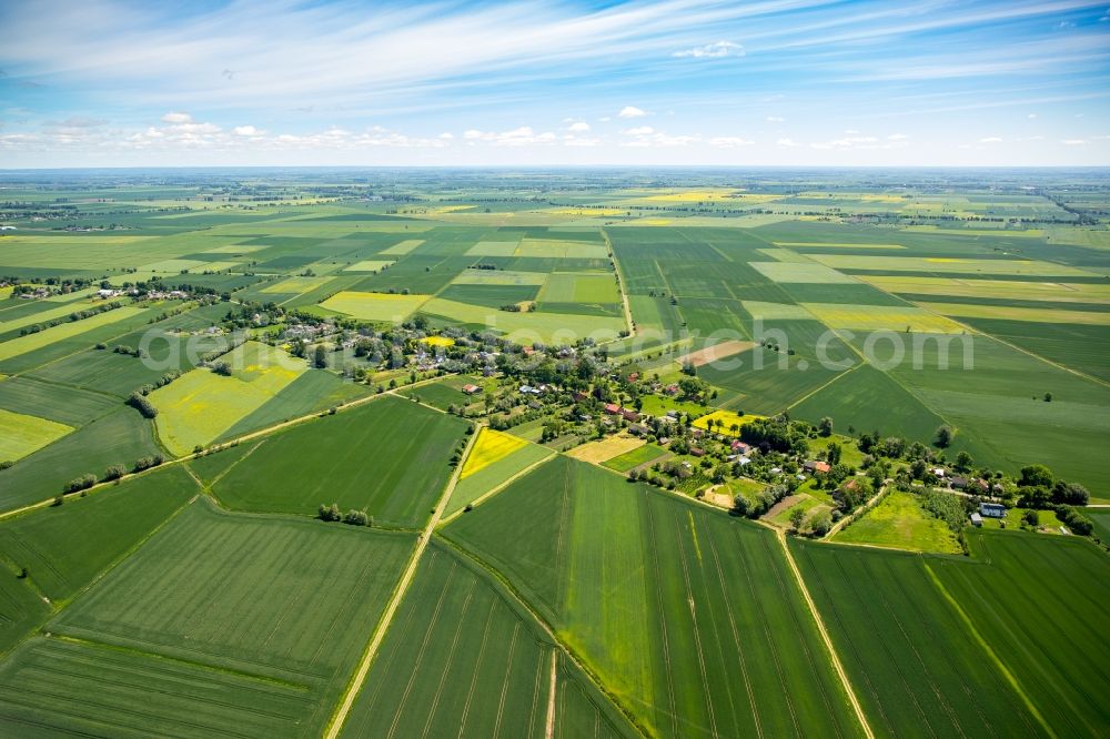 Pregowo Zulawskie from above - Village - view on the edge of agricultural fields and farmland in Pregowo Zulawskie in Pomorskie, Poland