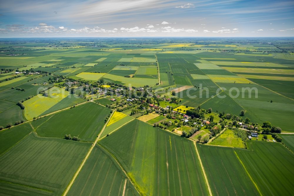 Pregowo Zulawskie from the bird's eye view: Village - view on the edge of agricultural fields and farmland in Pregowo Zulawskie in Pomorskie, Poland