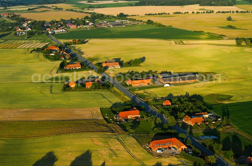 Raden from above - Village - view on the edge of agricultural fields and farmland in Raden in the state Mecklenburg - Western Pomerania, Germany