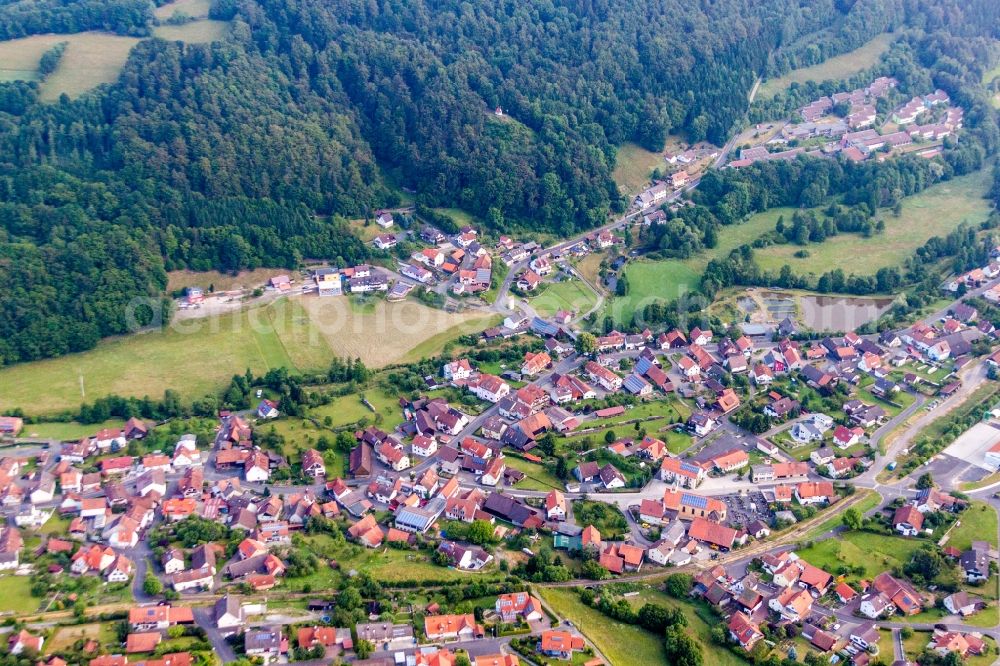 Aerial image Riedenberg - Village - view on the edge of agricultural fields and farmland in Riedenberg in the state Bavaria, Germany