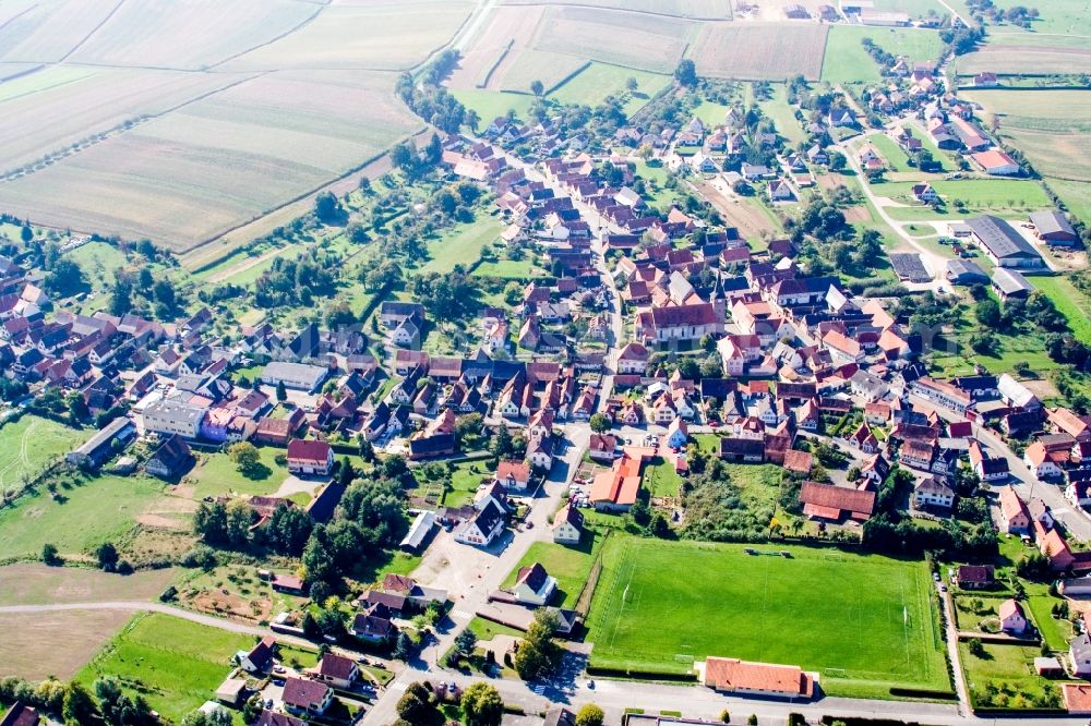 Aerial image Riedseltz - Village - view on the edge of agricultural fields and farmland in Riedseltz in Grand Est, France