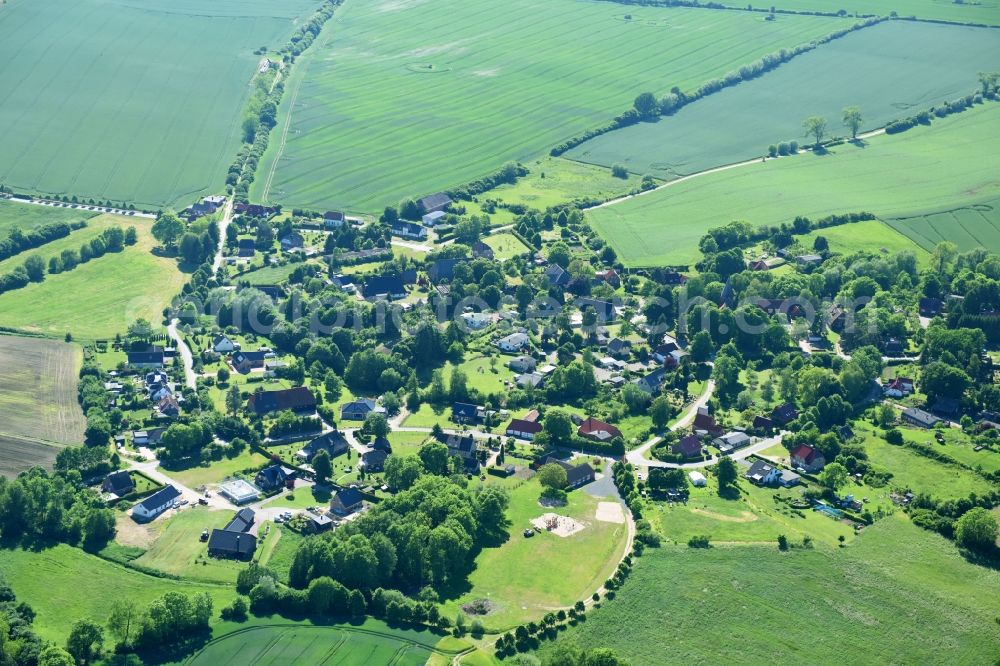 Aerial photograph Roggenstorf - Village - view on the edge of agricultural fields and farmland in Roggenstorf in the state Mecklenburg - Western Pomerania, Germany