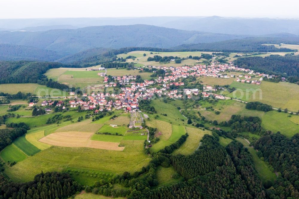 Rothenberg from the bird's eye view: Village - view on the edge of agricultural fields and farmland in Rothenberg in the state Hesse, Germany