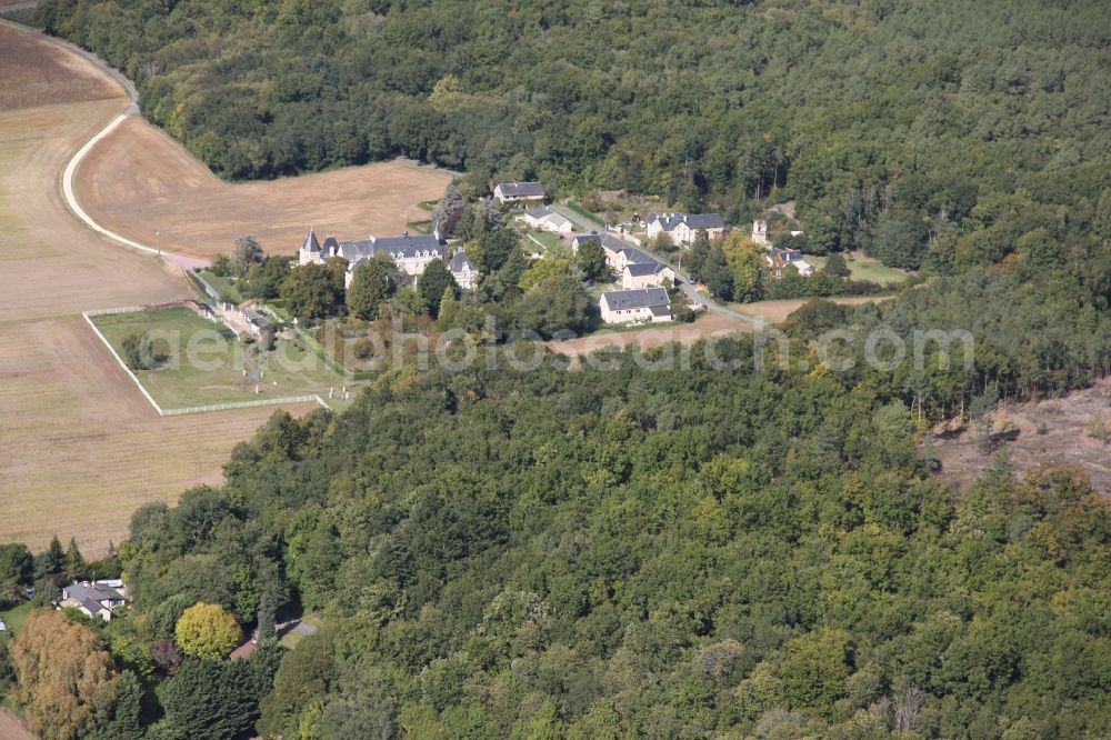 Saint Benoit la Foret from the bird's eye view: Village - view on the edge of agricultural fields and farmland in Saint Benoit la Foret in Centre-Val de Loire, France