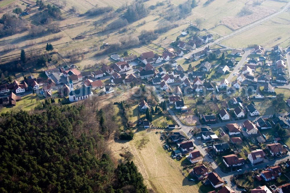 Schindhard from the bird's eye view: Village - view on the edge of agricultural fields and farmland in Schindhard in the state Rhineland-Palatinate, Germany