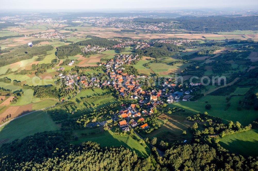 Schlaifhausen from above - Village - view on the edge of agricultural fields and farmland in Schlaifhausen in the state Bavaria, Germany