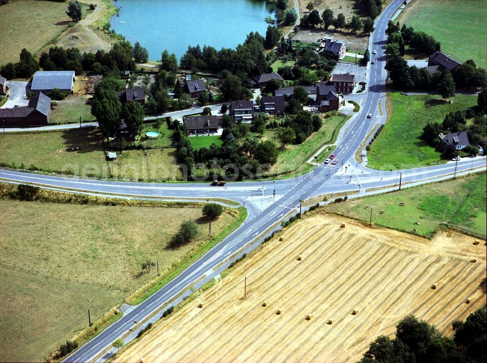 Aerial image Schmelendorf - Village - view on the edge of agricultural fields and farmland in Schmelendorf in the state North Rhine-Westphalia