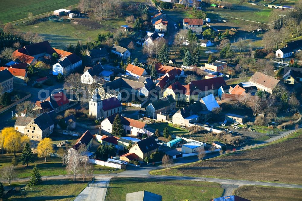 Schmirma from the bird's eye view: Village - view on the edge of agricultural fields and farmland in Schmirma in the state Saxony-Anhalt, Germany