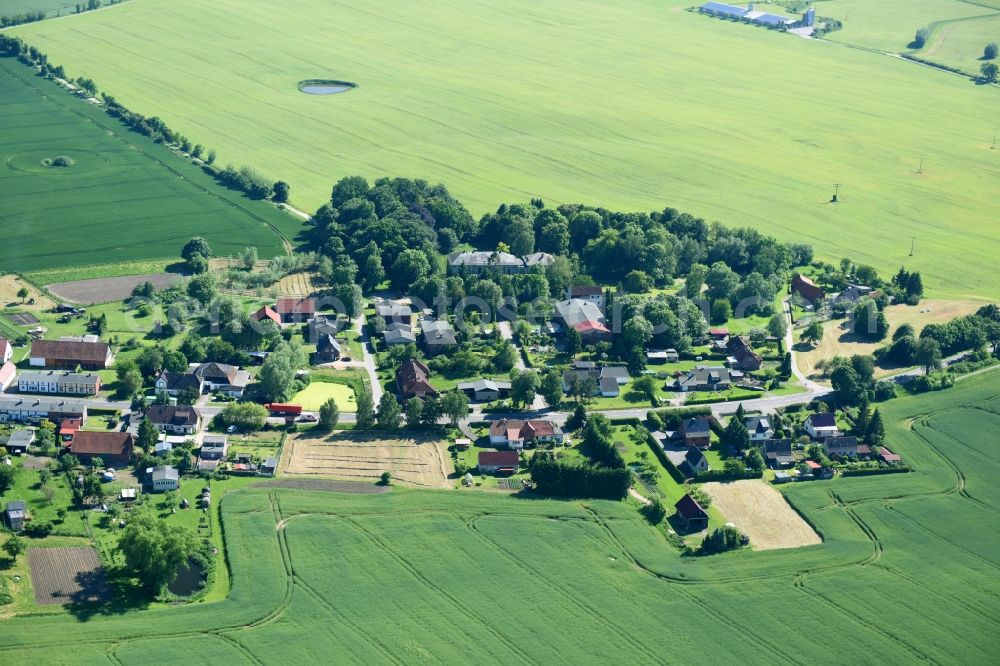 Schönhof from above - Village - view on the edge of agricultural fields and farmland in Schoenhof in the state Mecklenburg - Western Pomerania, Germany