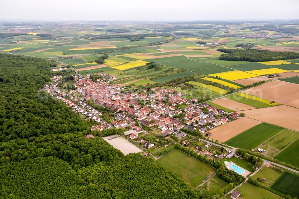 Schraudenbach from the bird's eye view: Village - view on the edge of agricultural fields and farmland in Schraudenbach in the state Bavaria, Germany