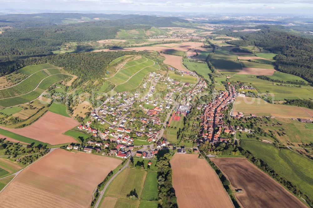 Schützingen from above - Village - view on the edge of agricultural fields and farmland in Schuetzingen in the state Baden-Wurttemberg, Germany