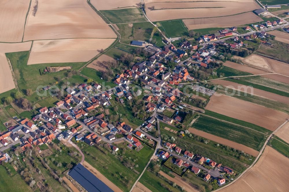 Siegen from above - Village - view on the edge of agricultural fields and farmland in Siegen in Grand Est, France