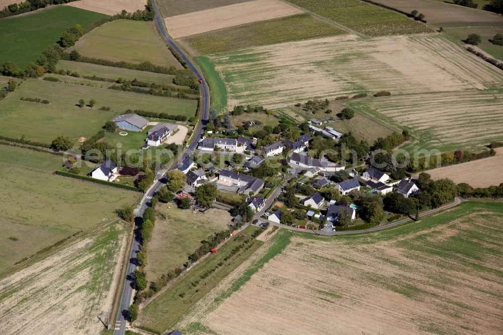 Aerial image Soulaines sur Aubance - Village - view on the edge of agricultural fields and farmland in Soulaines sur Aubance in Pays de la Loire, France