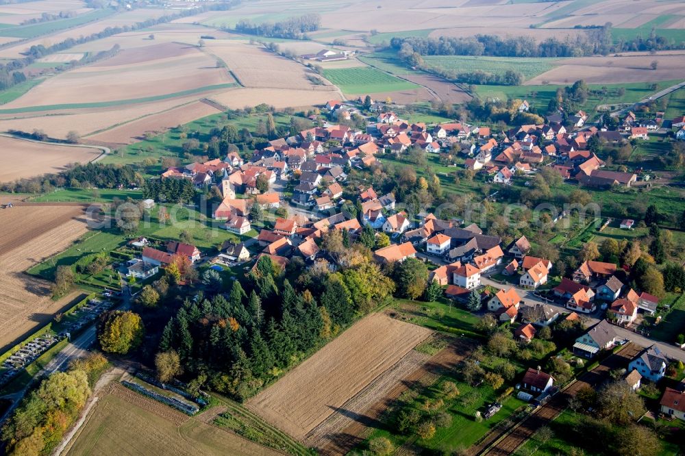 Aerial image Soultz-sous-Forêts - Village - view on the edge of agricultural fields and farmland in Soultz-sous-Forets in Grand Est, France