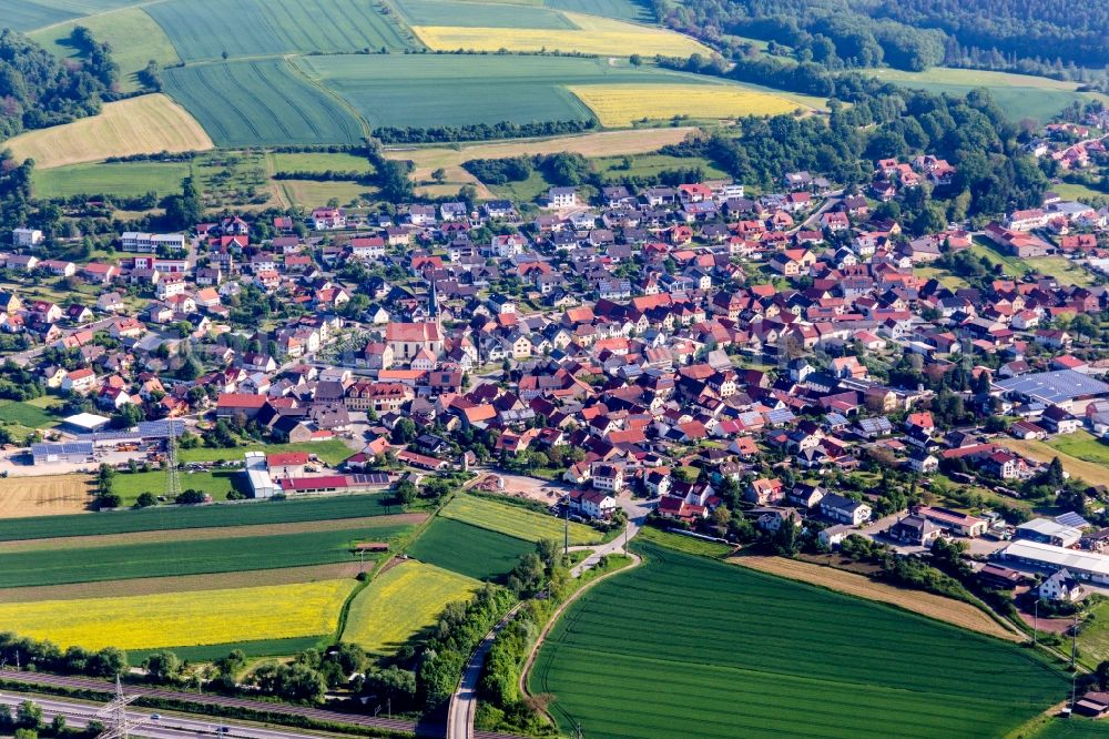 Aerial photograph Stettfeld - Village - view on the edge of agricultural fields and farmland in Stettfeld in the state Bavaria, Germany